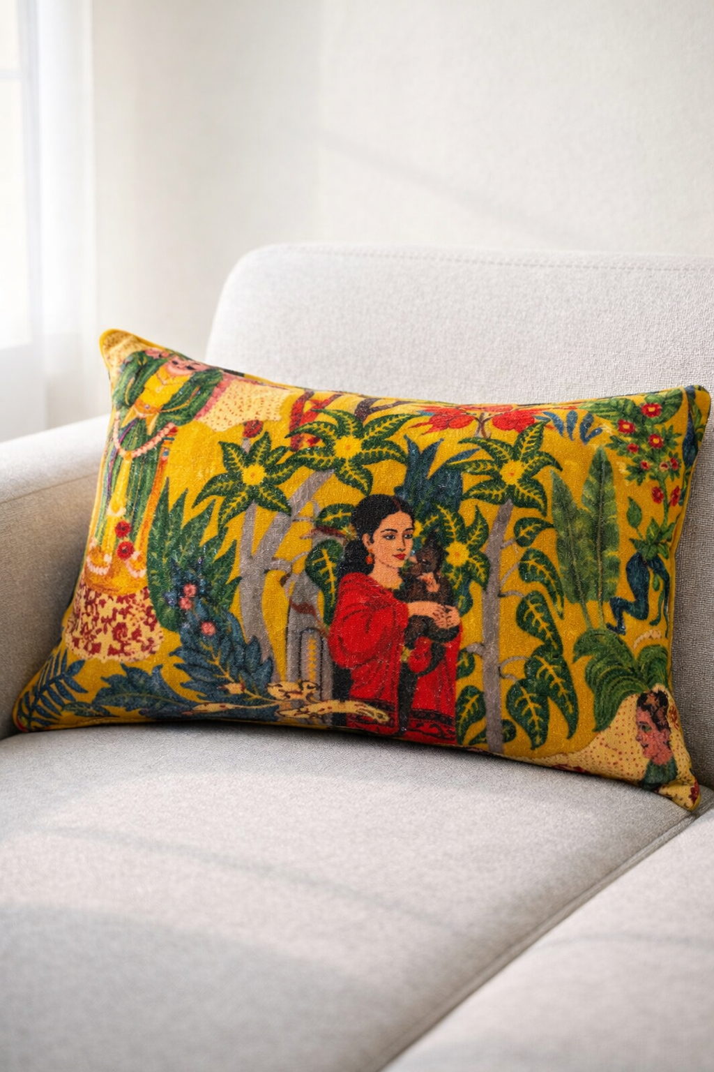 Decorative pillow with a colorful design on a white couch
