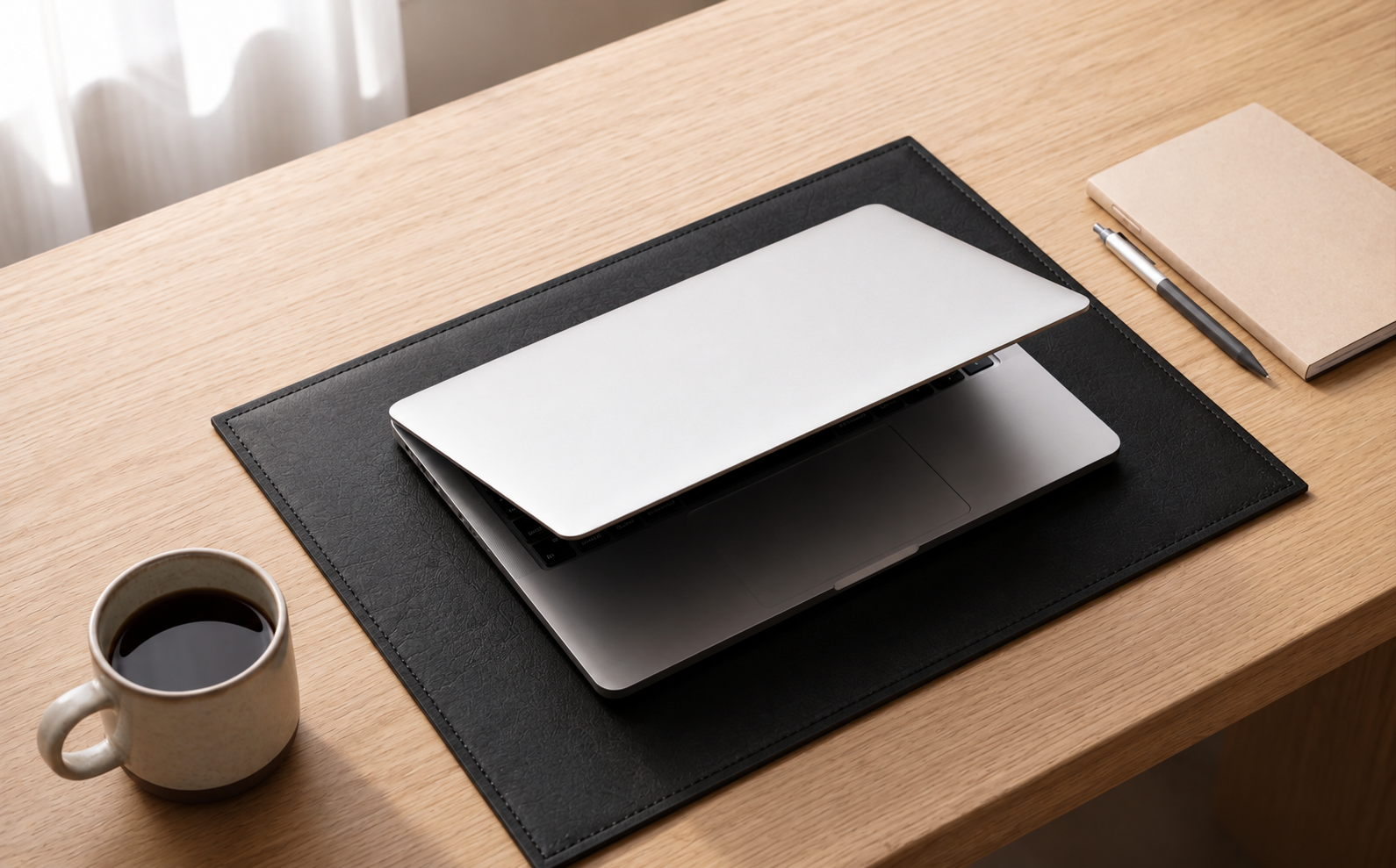 Multi-purpose black leather desk pad for office workspace and writing