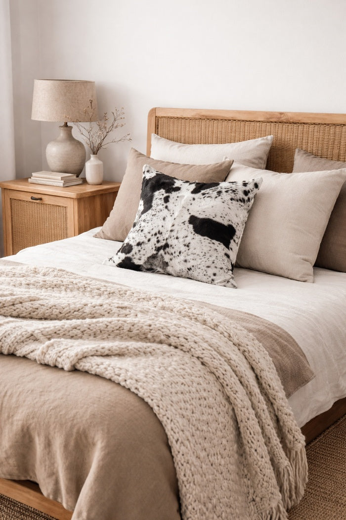 Handcrafted black and white cowhide leather cushion cover