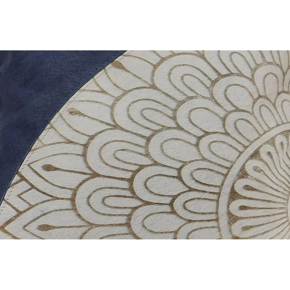 Modern mandala cowhide leather cushion in blue and cream for home interiors