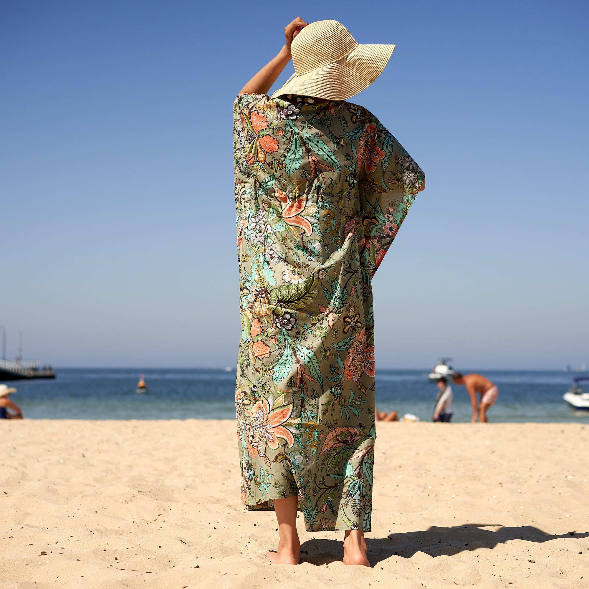 Artisan inspired floral cotton kaftan beach outfit
Women’s white kaftan dress for tropical holidays
Relaxed cotton floral kaftan for resort fashion