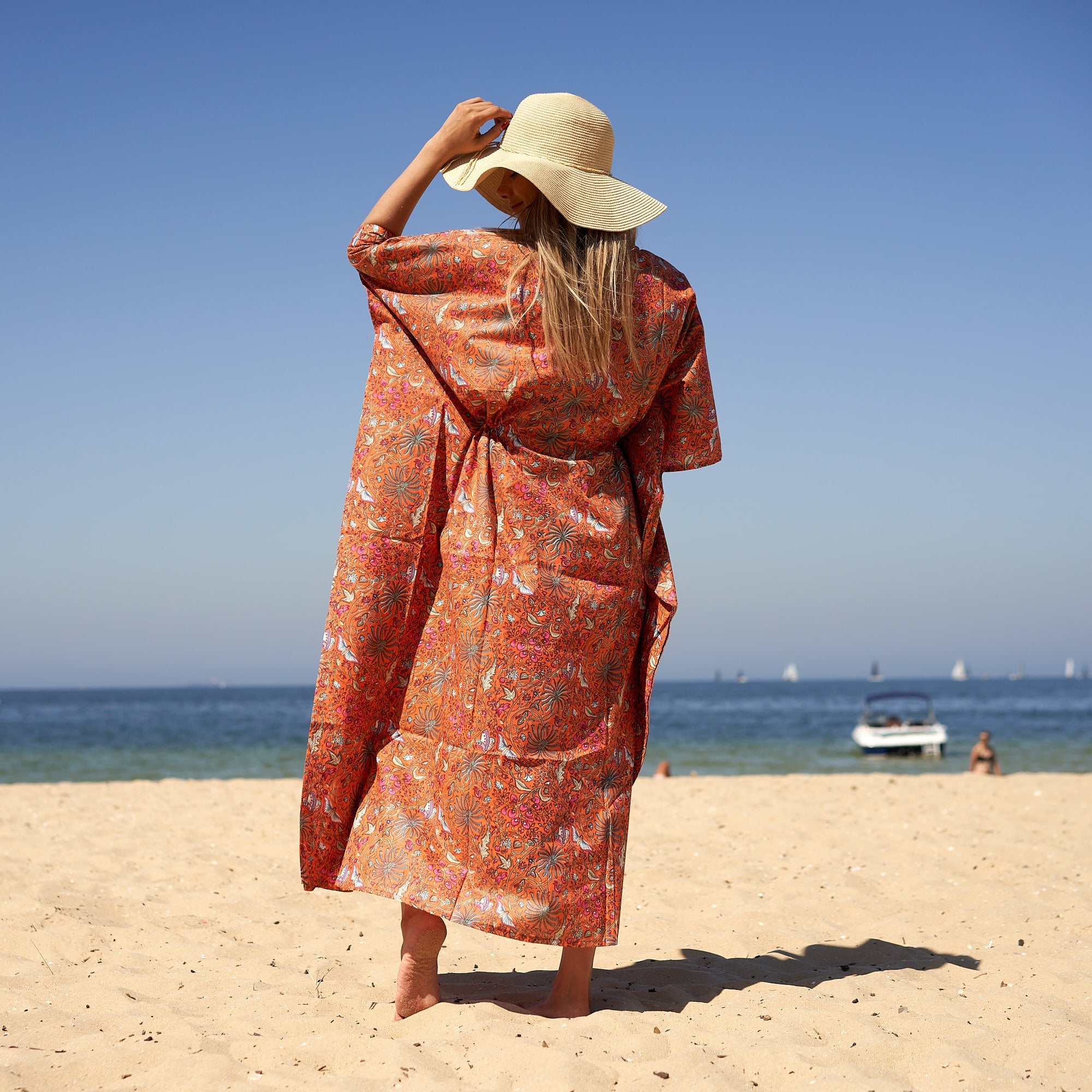 Artisan cotton floral kaftan tropical holiday look
Women’s beach kaftan dress vacation styling outfit
Relaxed cotton butterfly kaftan summer fashion outfit