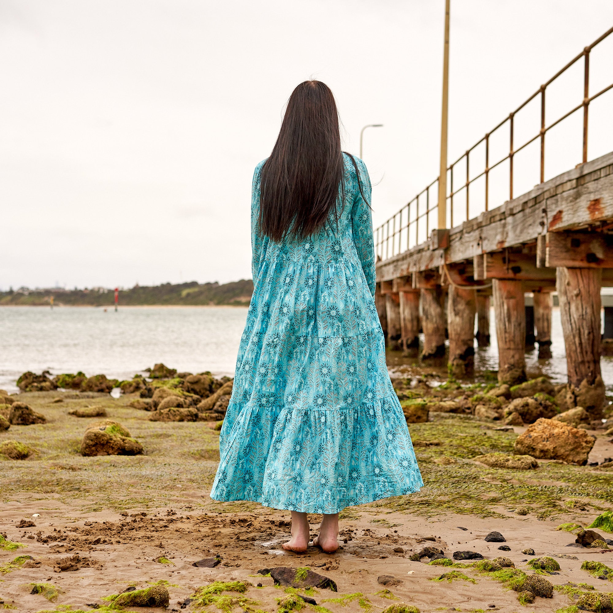 Lightweight cotton boho dress with long sleeves, airy summer outfit women.
Handcrafted floral maxi dress in cotton, elegant boho fashion Australia.