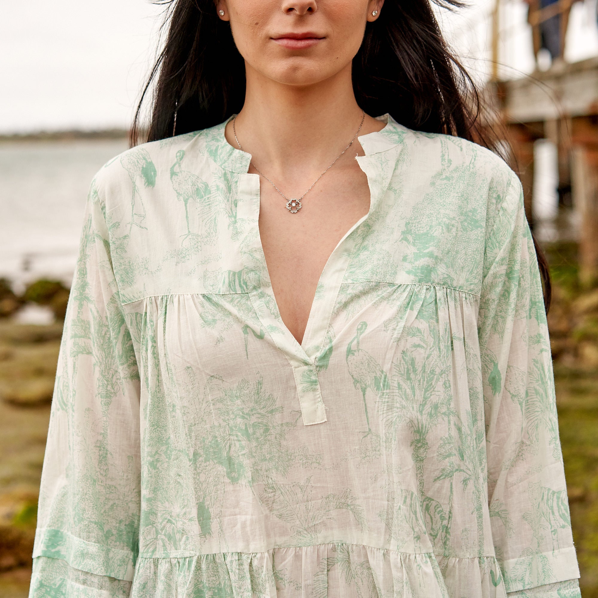 Long sleeve boho maxi dress with floral design, perfect for coastal summer style.
Lightweight cotton maxi dress with tiered flow, casual holiday outfit women.