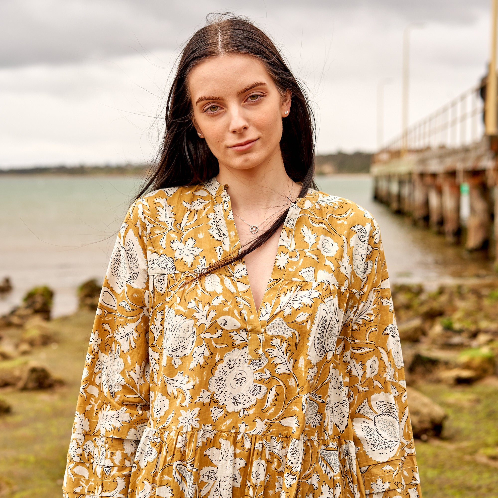 Long sleeve boho maxi dress in soft cotton, perfect for coastal summer style.
Lightweight floral maxi dress with flowy silhouette, casual vacation outfit women.