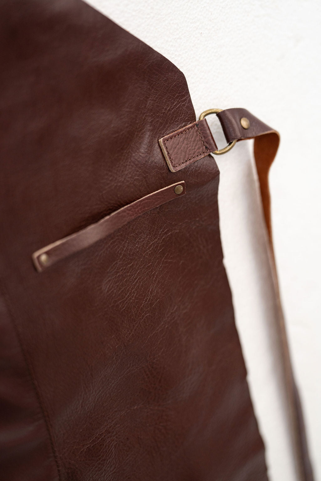 Premium chestnut leather apron designed for professional and home use