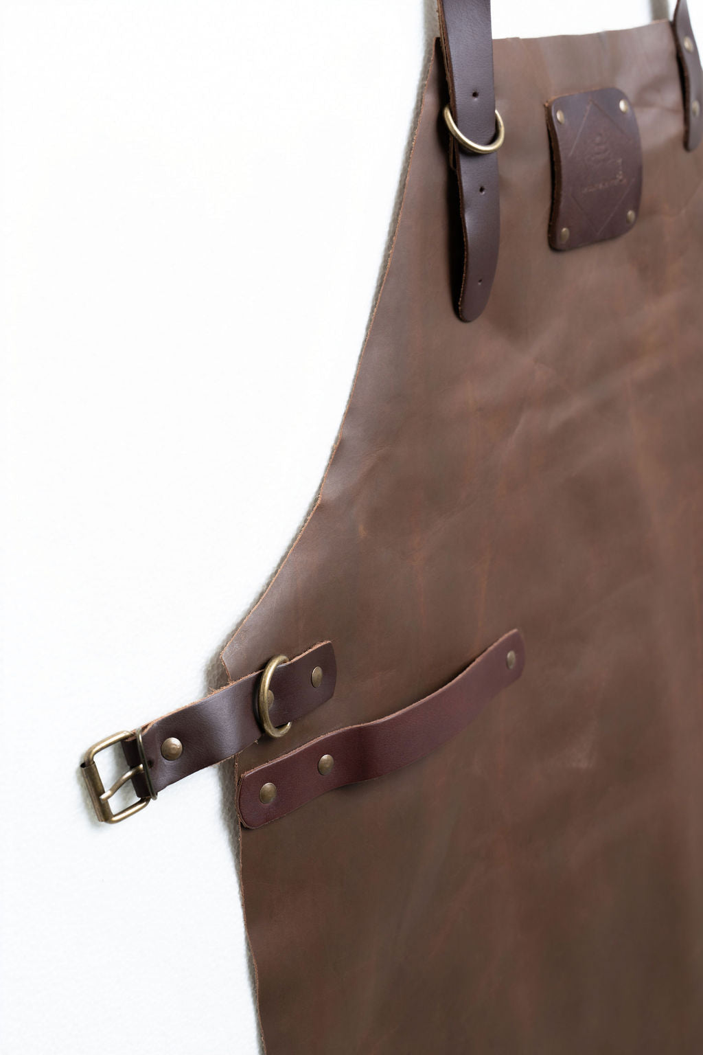 Professional brown leather apron full-length for cooking and crafting