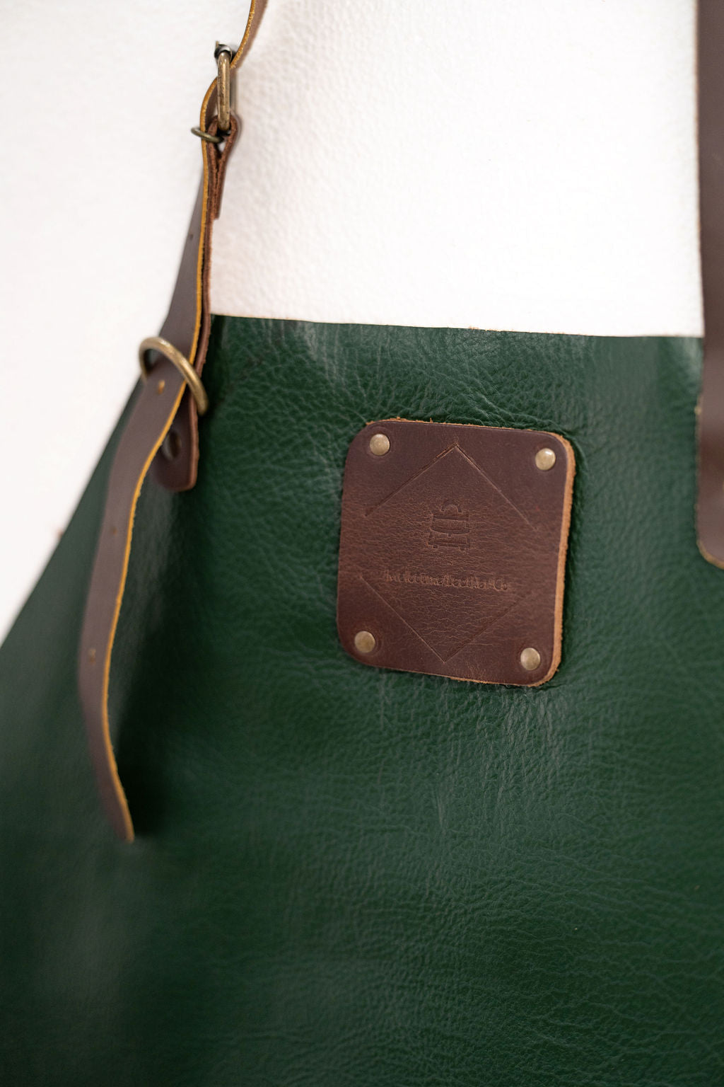 Luxury forest green leather apron for barber chef and artisan work