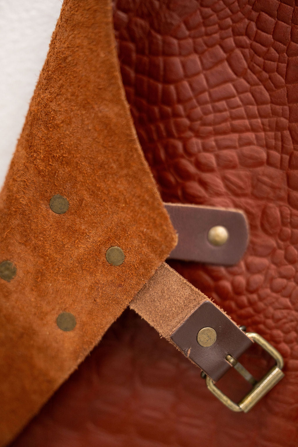 Luxury textured leather apron with croc emboss finish and full coverage