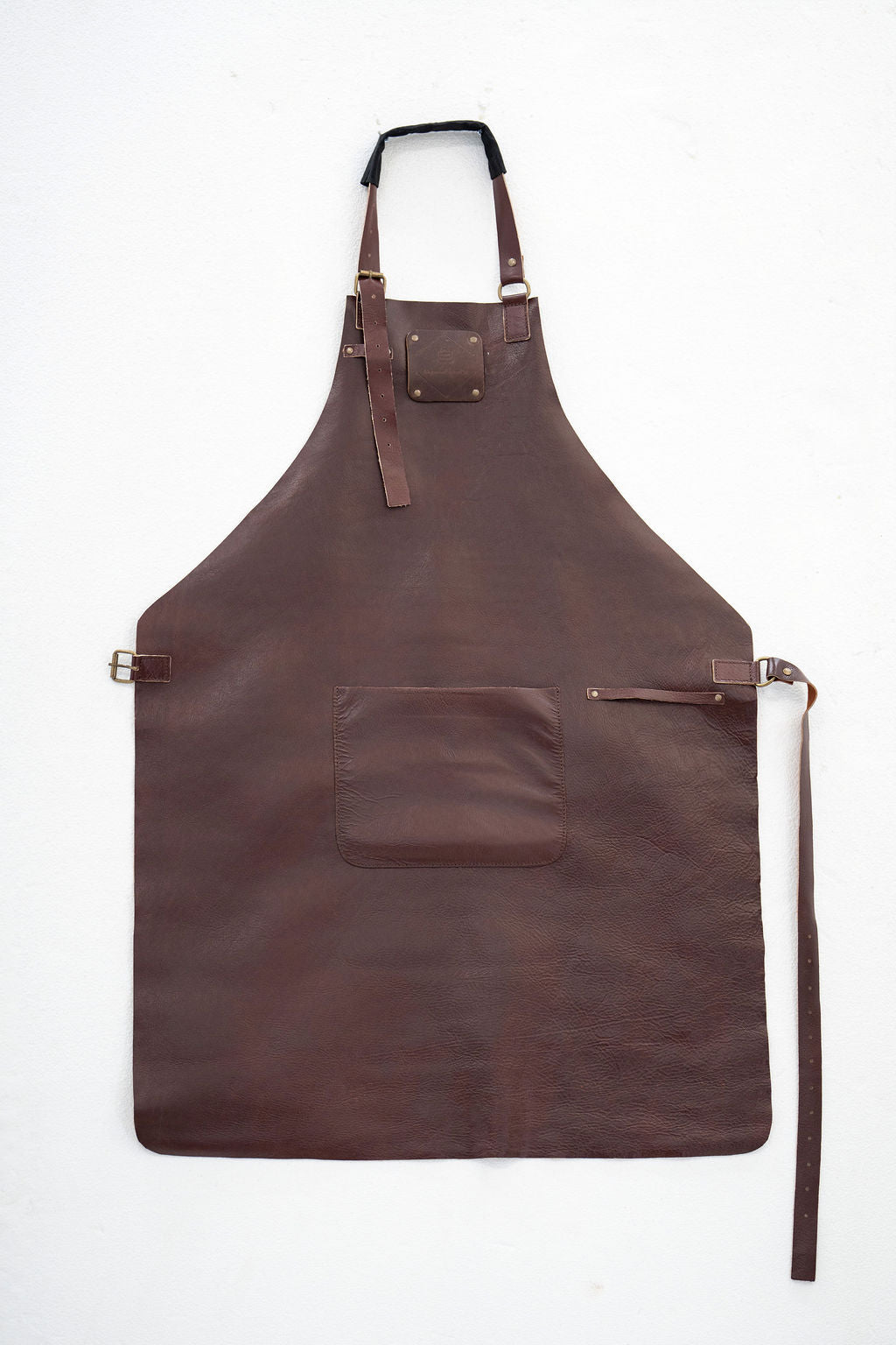 Stylish handmade chestnut leather apron for kitchen and workshop