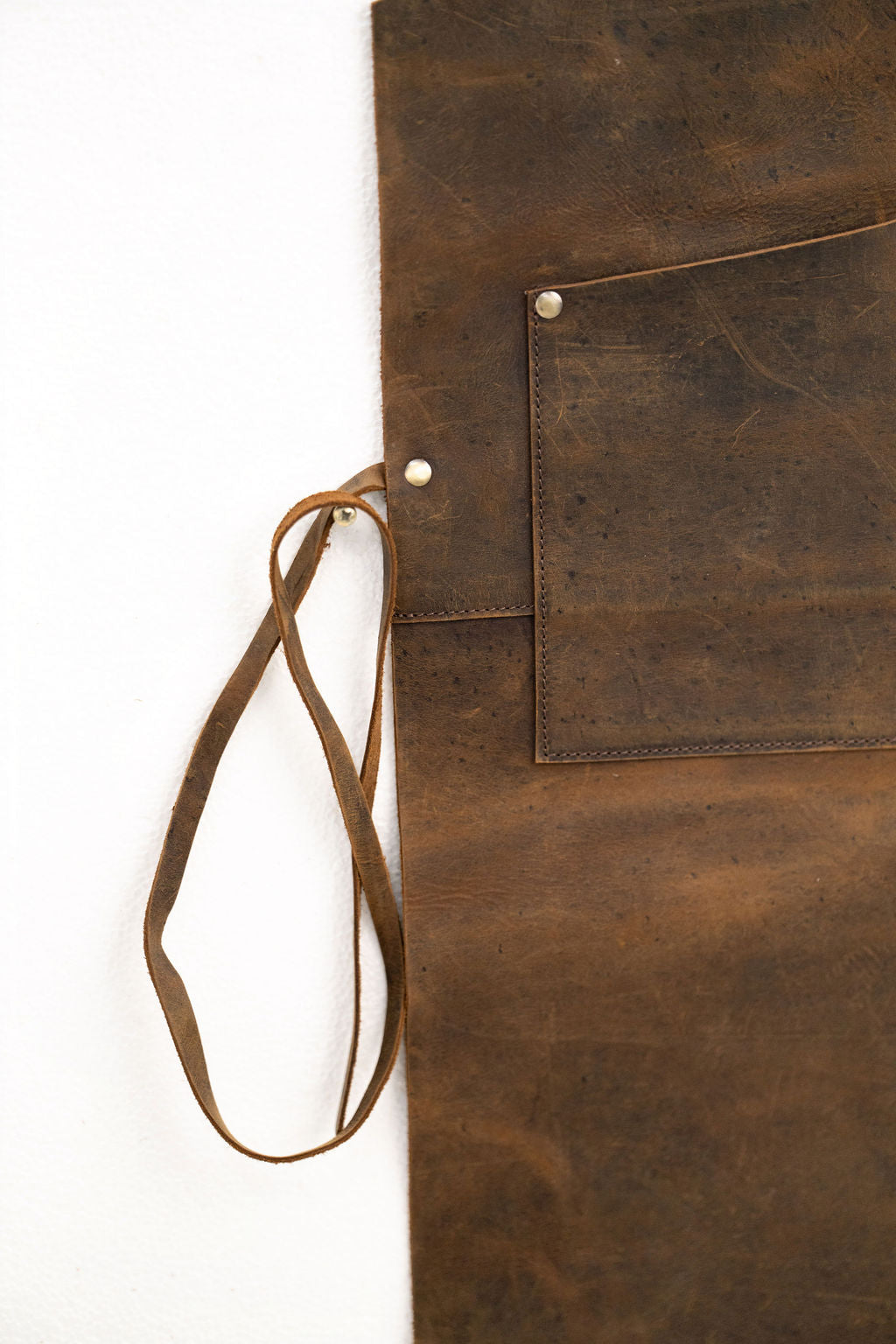 Professional brown leather apron with pockets for woodworking and BBQ