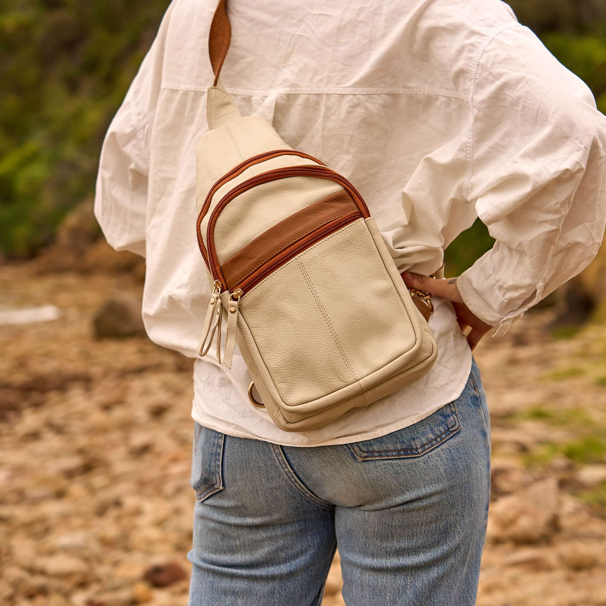 Stylish genuine leather crossbody purse for women featuring secure zip pockets and spacious storage