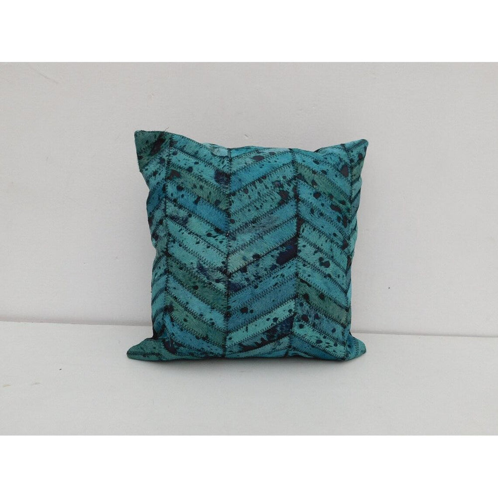 Teal hide and leather patchwork cushion cover with organic texture