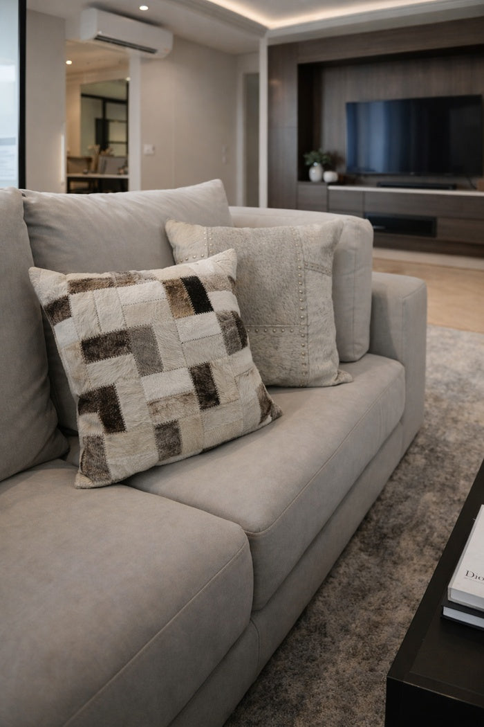 Luxury neutral cowhide leather cushion cover 45x45 cm featuring checkerboard design for stylish living spaces