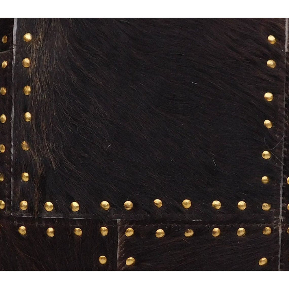 Modern rustic studded cowhide leather cushion cover designed with hide front and cotton linen back