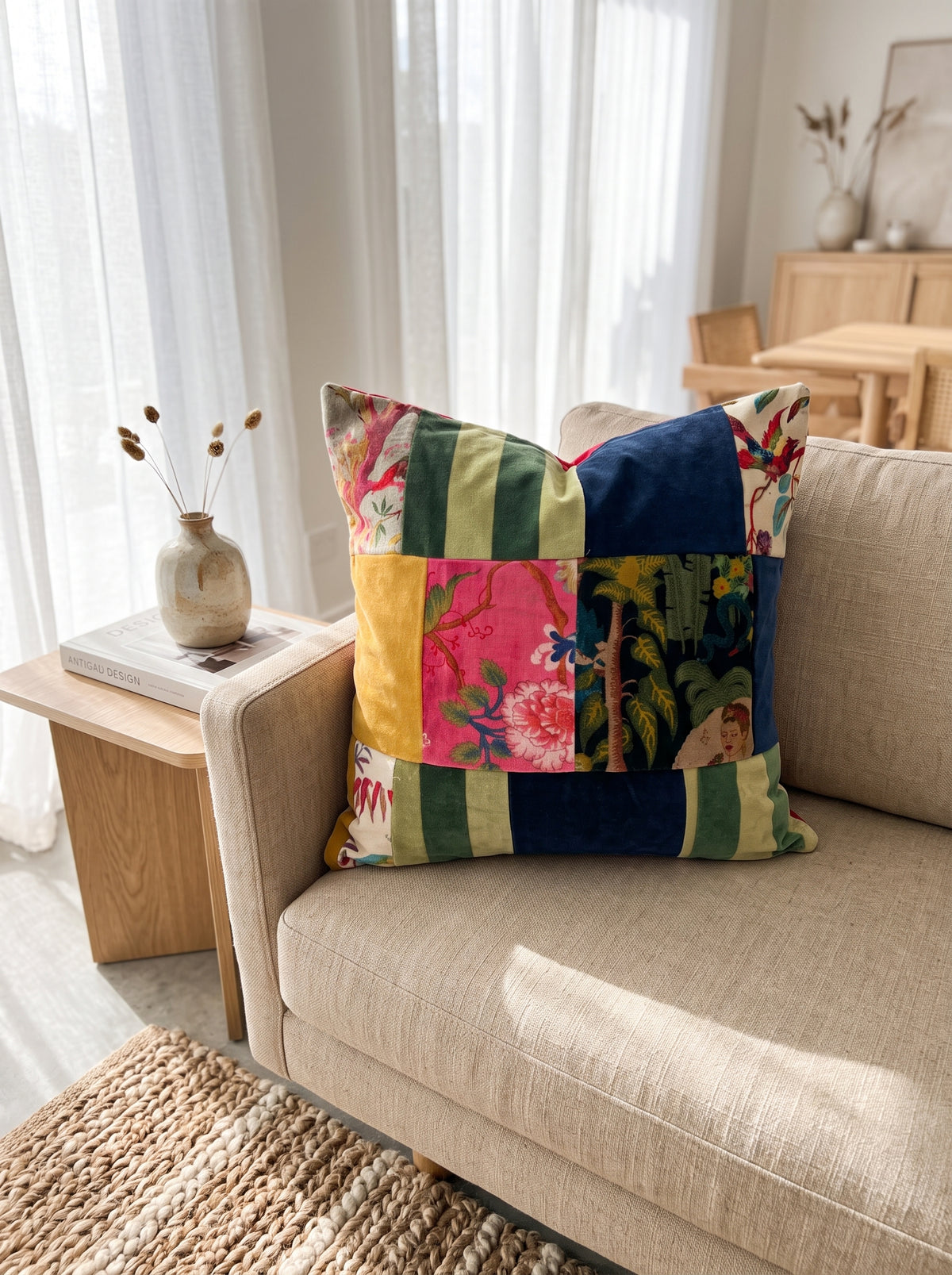Multicolour boho patchwork cushion cover on beige linen sofa