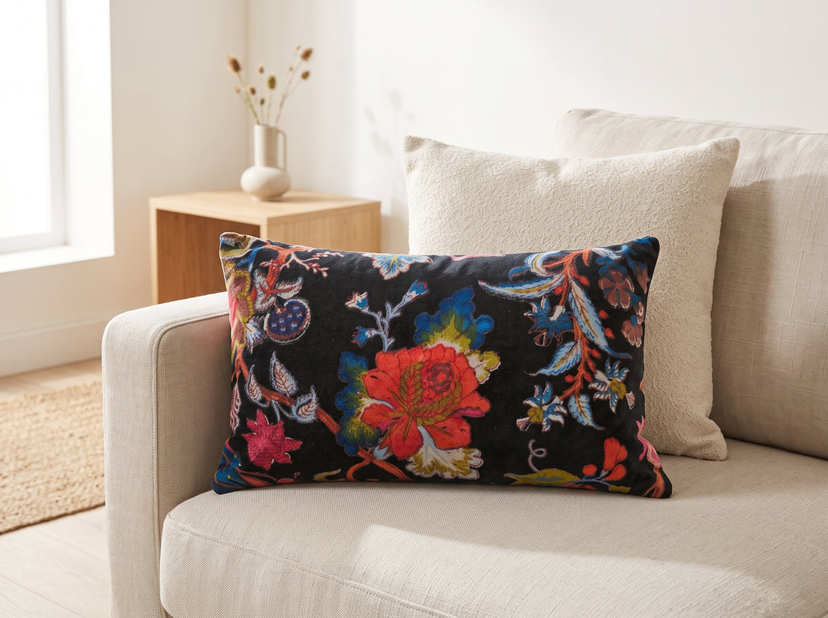 Botanical velvet lumbar cushion cover styled on tan leather sofa
