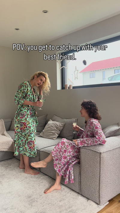 Airy floral cotton dress, perfect for warm weather and beach outings
Model wearing floral boho maxi dress, elegant summer fashion look